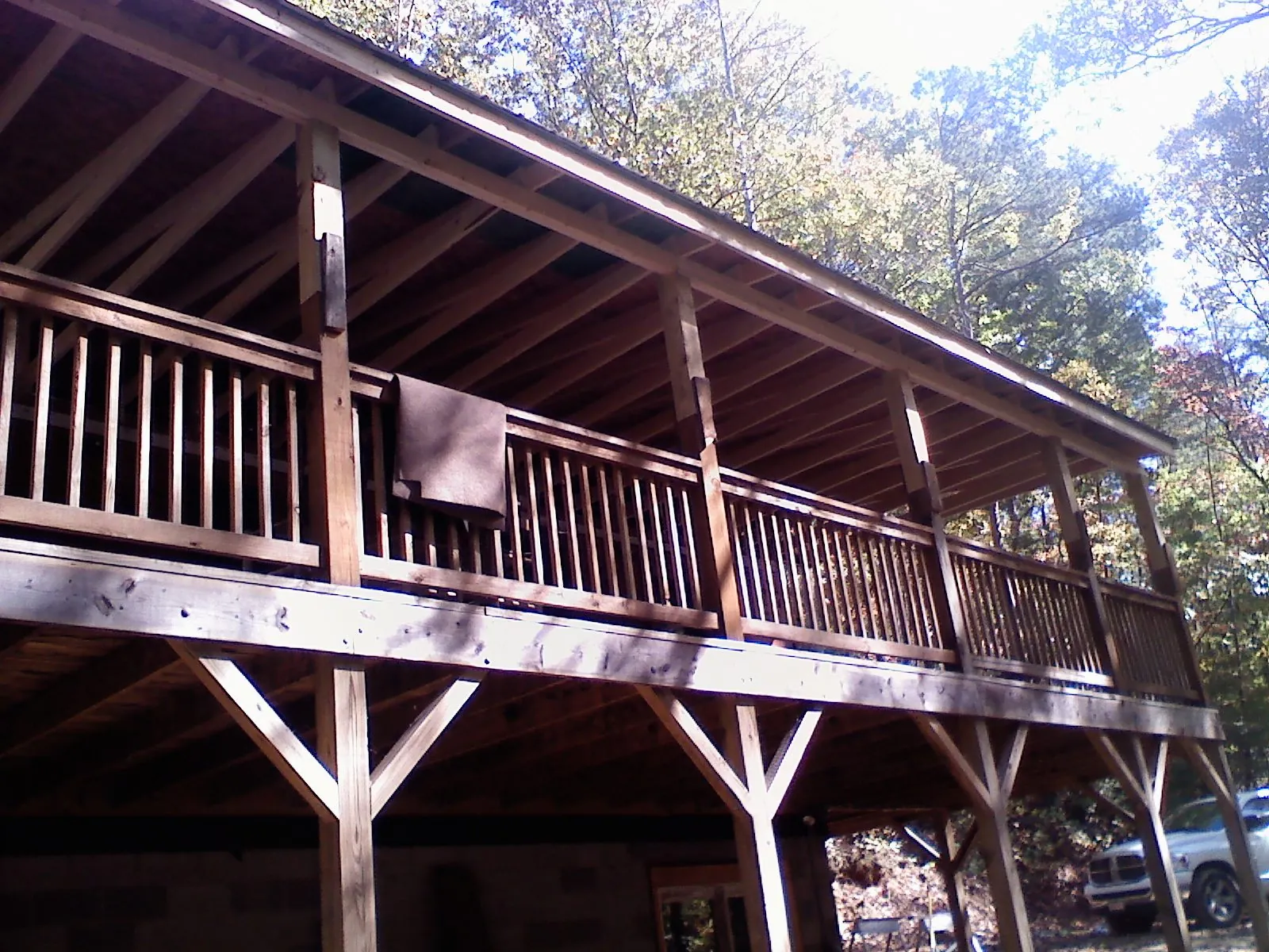 Timber framing under a new elevated porch and deck — Roof Leak Repair in Grabill by Roofing Brothers